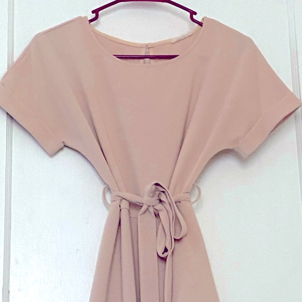 Tan blouse, very fun to dress up.